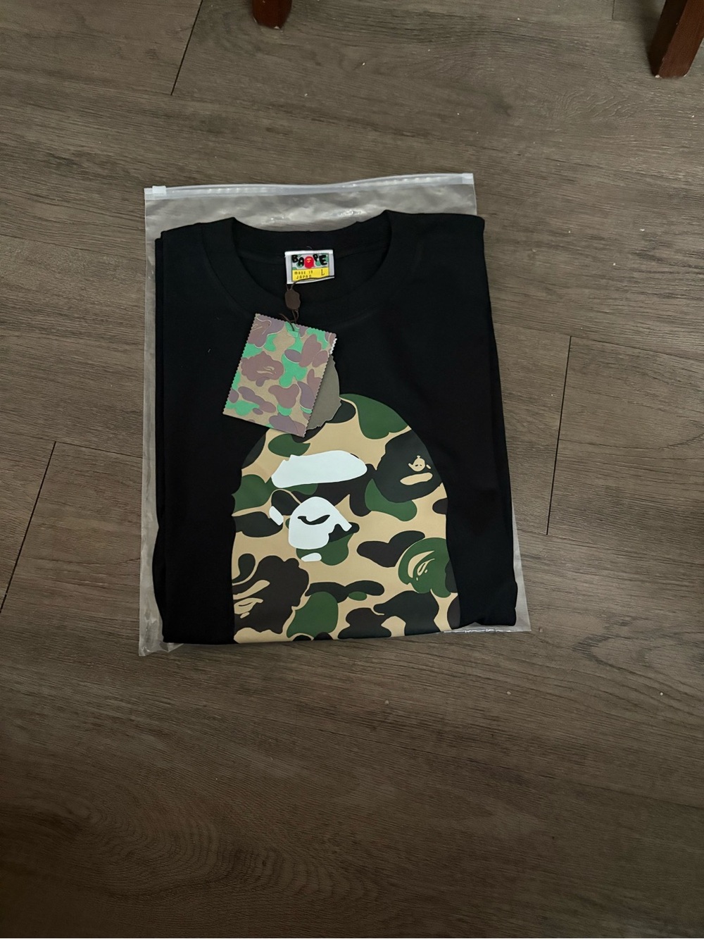 Bape Black Tee with Green Camo Ape Head Graphic